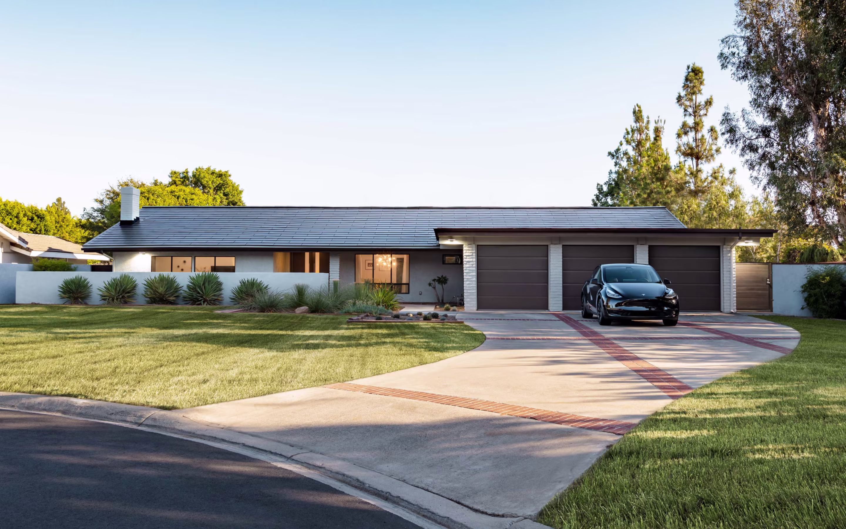 House with Tesla Solar Roof tiles integrated seamlessly
